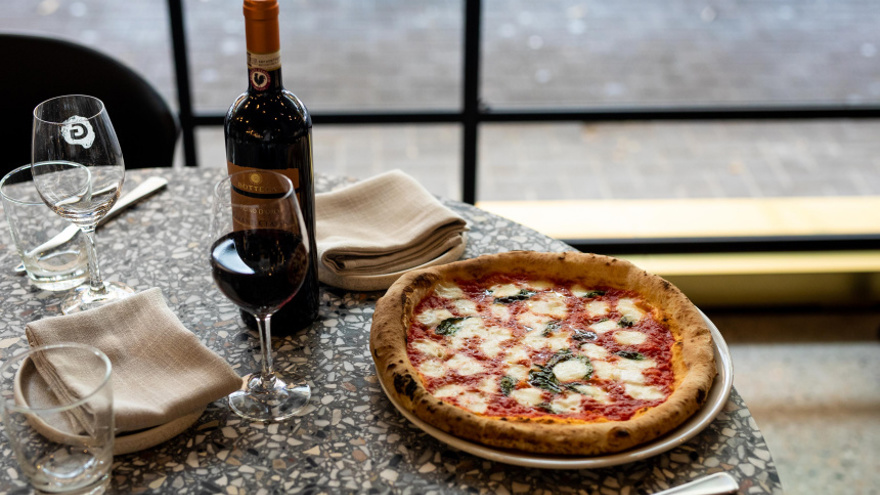 Pizza Served with a Glass of Wine